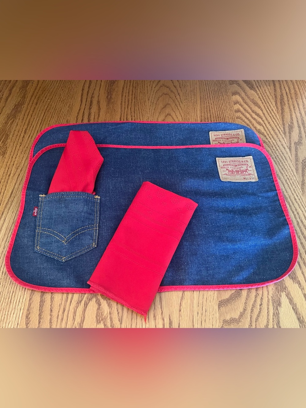 Two Levi's Blue Denim Placemats with Red Trim and Napkins